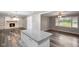 View of the Kitchen Island and the Living Room with Fireplace at 9378 N County Road 75 W, Lizton, IN 46149