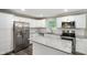 Beautiful kitchen featuring stainless steel refrigerator, granite countertops and a stylish island at 9378 N County Road 75 W, Lizton, IN 46149
