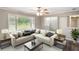 Bright living room with a large window, comfortable seating, and neutral decor at 9378 N County Road 75 W, Lizton, IN 46149