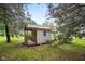 Charming backyard playhouse with natural wood accents and a cozy, inviting design at 9378 N County Road 75 W, Lizton, IN 46149
