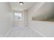 Bedroom with a gray carpet, white walls, a window, and a neutral ceiling light at 9406 Avon Strand # Apt A, Avon, IN 46123