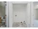 Dedicated laundry room includes hookups and tiled flooring for convenience and functionality at 9406 Avon Strand # Apt A, Avon, IN 46123