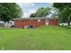 View of the expansive yard from the back of the house, featuring a brick exterior at 9974 N 850 W, Fairland, IN 46126