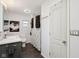 Bright bathroom features a modern vanity, patterned shower curtain, and sleek fixtures at 9974 N 850 W, Fairland, IN 46126