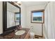 Cozy bathroom featuring a wood framed mirror, granite countertop, and tub with shower at 9974 N 850 W, Fairland, IN 46126