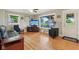 Cozy living room with hardwood floors, television, and great natural light at 9974 N 850 W, Fairland, IN 46126