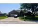 Charming brick home with well-manicured lawn, two-car garage, and inviting front entrance at 1027 Plum St # 39, Brownsburg, IN 46112