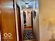 Inviting hallway with wood flooring and a decorative runner at 1027 Plum St # 39, Brownsburg, IN 46112