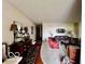 Inviting living room with hardwood floors, neutral carpet, elegant decor, and comfortable seating at 1027 Plum St # 39, Brownsburg, IN 46112