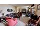 Inviting living room featuring plush seating, warm lighting, and an adjacent dining area at 1027 Plum St # 39, Brownsburg, IN 46112