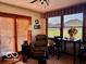 Relaxing living room with wooden blinds, ample natural light, and a cozy reading nook at 1027 Plum St # 39, Brownsburg, IN 46112