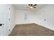 Bedroom featuring neutral carpet, ceiling fan, and natural light at 1038 W 33Rd St, Indianapolis, IN 46208