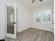 Bright bedroom featuring a neutral color palette, ceiling fan and ample natural light at 1038 W 33Rd St, Indianapolis, IN 46208