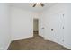 Bedroom with neutral carpeting, ceiling fan, and white trim at 1038 W 33Rd St, Indianapolis, IN 46208
