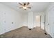 Bedroom with neutral carpet, ample light and ceiling fan at 1038 W 33Rd St, Indianapolis, IN 46208