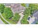 Sprawling home with mature trees, a long driveway, and lush landscaping at 10471 Winghaven Dr, Noblesville, IN 46060