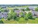Aerial view of home with a well manicured lawn and mature landscaping at 10471 Winghaven Dr, Noblesville, IN 46060