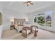 Bright primary bedroom with a vaulted ceiling, sitting area, and large windows at 10471 Winghaven Dr, Noblesville, IN 46060