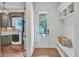Mudroom/laundry area with built-in bench and cubbies, offers practical entryway storage solutions at 10471 Winghaven Dr, Noblesville, IN 46060