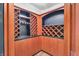 A custom wine cellar with ample storage and decorative wood racking at 10471 Winghaven Dr, Noblesville, IN 46060