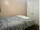 Bedroom featuring a queen-sized bed and a closet with double doors at 108 Meadowview Dr, Mooresville, IN 46158
