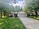 Charming single-story home with a well-maintained lawn and a two car garage at 108 Meadowview Dr, Mooresville, IN 46158