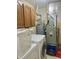 Functional laundry area including washer, dryer, water heater, furnace, and storage at 108 Meadowview Dr, Mooresville, IN 46158
