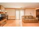 Cozy living room features a brown leather sofa and neutral walls, creating a warm and inviting atmosphere at 1111 Pendle Hill Ave, Pendleton, IN 46064