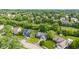 Neighborhood aerial view with tree-lined streets, well-manicured lawns, and diverse home styles, highlighting the community at 11218 Baycreek Dr, Indianapolis, IN 46236