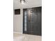 Stylish front door with decorative panels and glass insert, inside the home at 11218 Baycreek Dr, Indianapolis, IN 46236