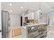 Kitchen featuring stainless steel appliances, tiled backsplash, and a breakfast bar at 11218 Baycreek Dr, Indianapolis, IN 46236