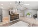 Open living space featuring wood floors, recessed lighting, and a view of the connected kitchen area at 11218 Baycreek Dr, Indianapolis, IN 46236