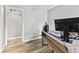 Office space featuring an expansive desk, laminate floors, and light-colored walls at 11218 Baycreek Dr, Indianapolis, IN 46236