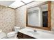 Bathroom featuring tile flooring, toilet, neutral toned walls, and vanity with large mirror at 116 Bennington Rd, Indianapolis, IN 46227