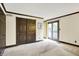 Spacious bedroom featuring double closets, trim and sliding door at 116 Bennington Rd, Indianapolis, IN 46227