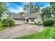 Charming home boasts stone accents, a well-maintained lawn, and a convenient two-car garage at 116 Bennington Rd, Indianapolis, IN 46227