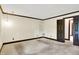 Spacious living room features a large open floor plan, neutral walls and base trim, ready for new owners at 116 Bennington Rd, Indianapolis, IN 46227