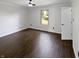 Bright and airy bedroom featuring hardwood floors and ample natural light at 11722 Hartland Dr, Indianapolis, IN 46229