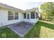 Home featuring a screened-in porch and patio overlooking a well-maintained lawn at 11830 Sand Creek Blvd, Fishers, IN 46037