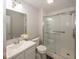 Clean bathroom featuring a glass-enclosed shower, neutral colors, and modern fixtures at 11830 Sand Creek Blvd, Fishers, IN 46037