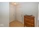 Bright entryway featuring hardwood floors and a stylish wooden dresser at 11830 Sand Creek Blvd, Fishers, IN 46037