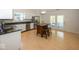 Bright kitchen with stainless steel appliances, granite countertops, and a wooden kitchen island at 11830 Sand Creek Blvd, Fishers, IN 46037