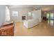 Bright living room with hardwood floors, a fireplace, and natural light at 11830 Sand Creek Blvd, Fishers, IN 46037