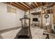 Finished basement featuring a treadmill, TV area and neutral carpet providing a comfortable workout space at 1229 Helford Ln, Carmel, IN 46032