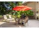 Expansive deck featuring multiple seating areas, a grill and a red umbrella for outdoor dining at 1229 Helford Ln, Carmel, IN 46032
