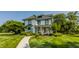 Charming two-story home with a welcoming front porch, surrounded by a well-manicured lawn at 1229 Helford Ln, Carmel, IN 46032