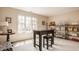 Bright office space with a large window and neutral colors, ready for creativity at 1229 Helford Ln, Carmel, IN 46032