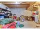 Unfinished basement with exposed ceiling and concrete walls ready for your updates at 12679 Chargers Ct, Fishers, IN 46037