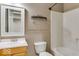 Bathroom featuring a single sink vanity, a toilet, and a bathtub shower at 12679 Chargers Ct, Fishers, IN 46037