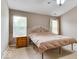 Cozy bedroom with neutral tones, plush carpeting, and natural light at 12679 Chargers Ct, Fishers, IN 46037